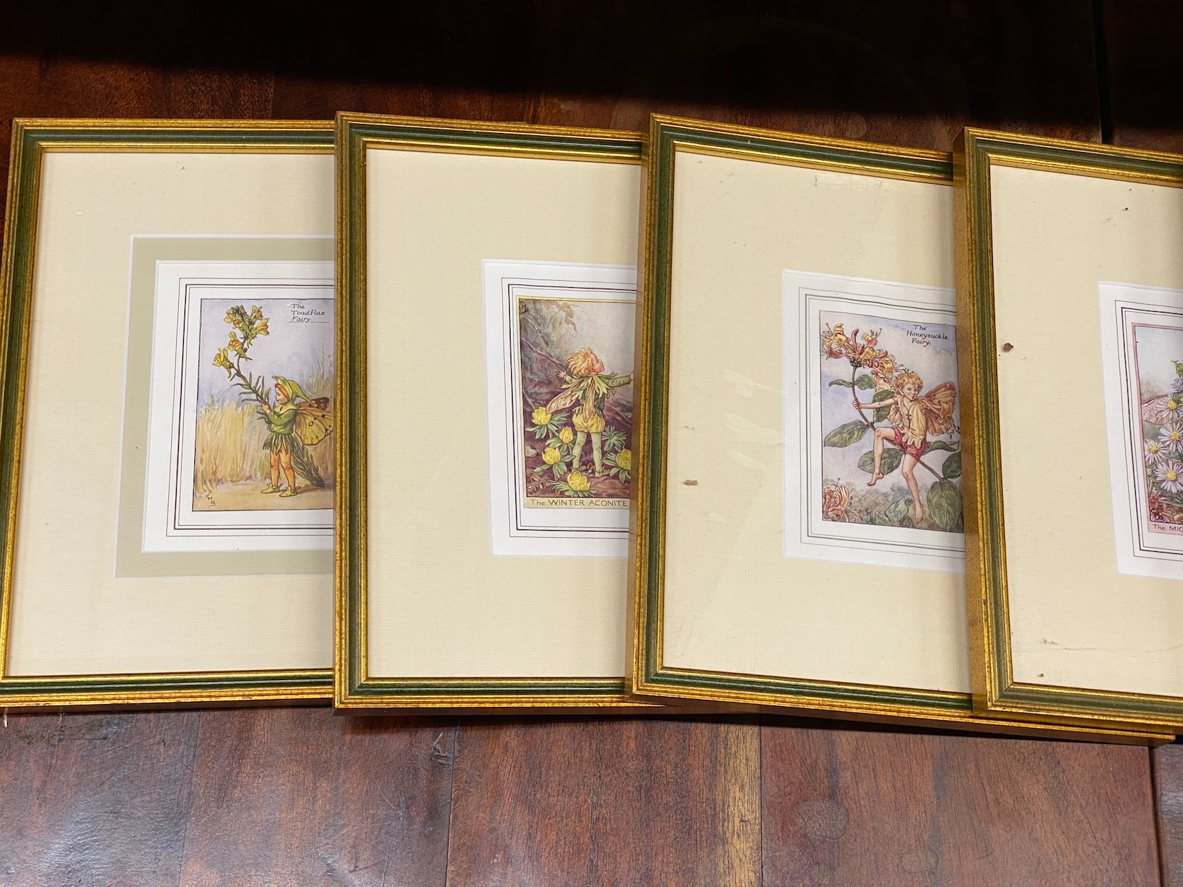 After Cicely Mary Barker - a set of six coloured prints of fairies, each 24 x 27cm including frames